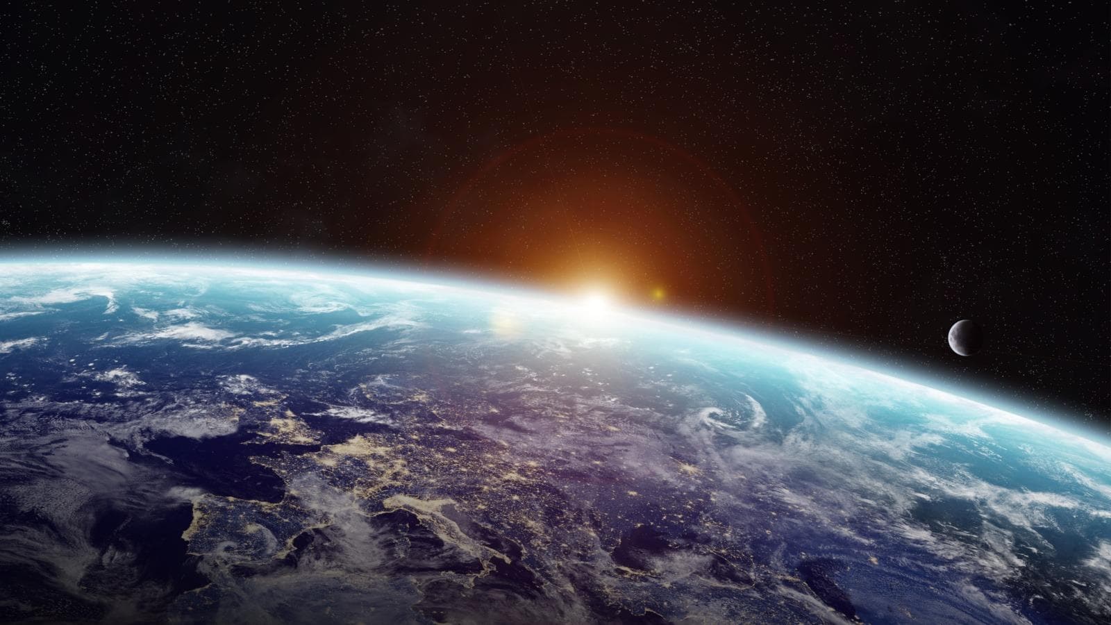 Sunrise over planet Earth in space