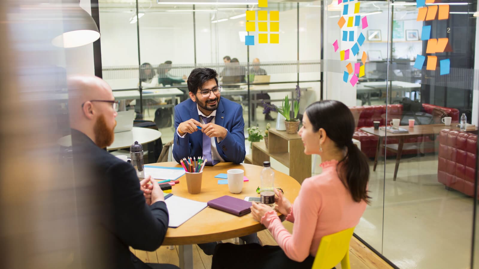 Creative business people brainstorming in conference room meeting
