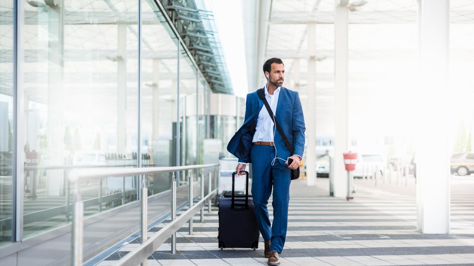Business traveler in airport terminal