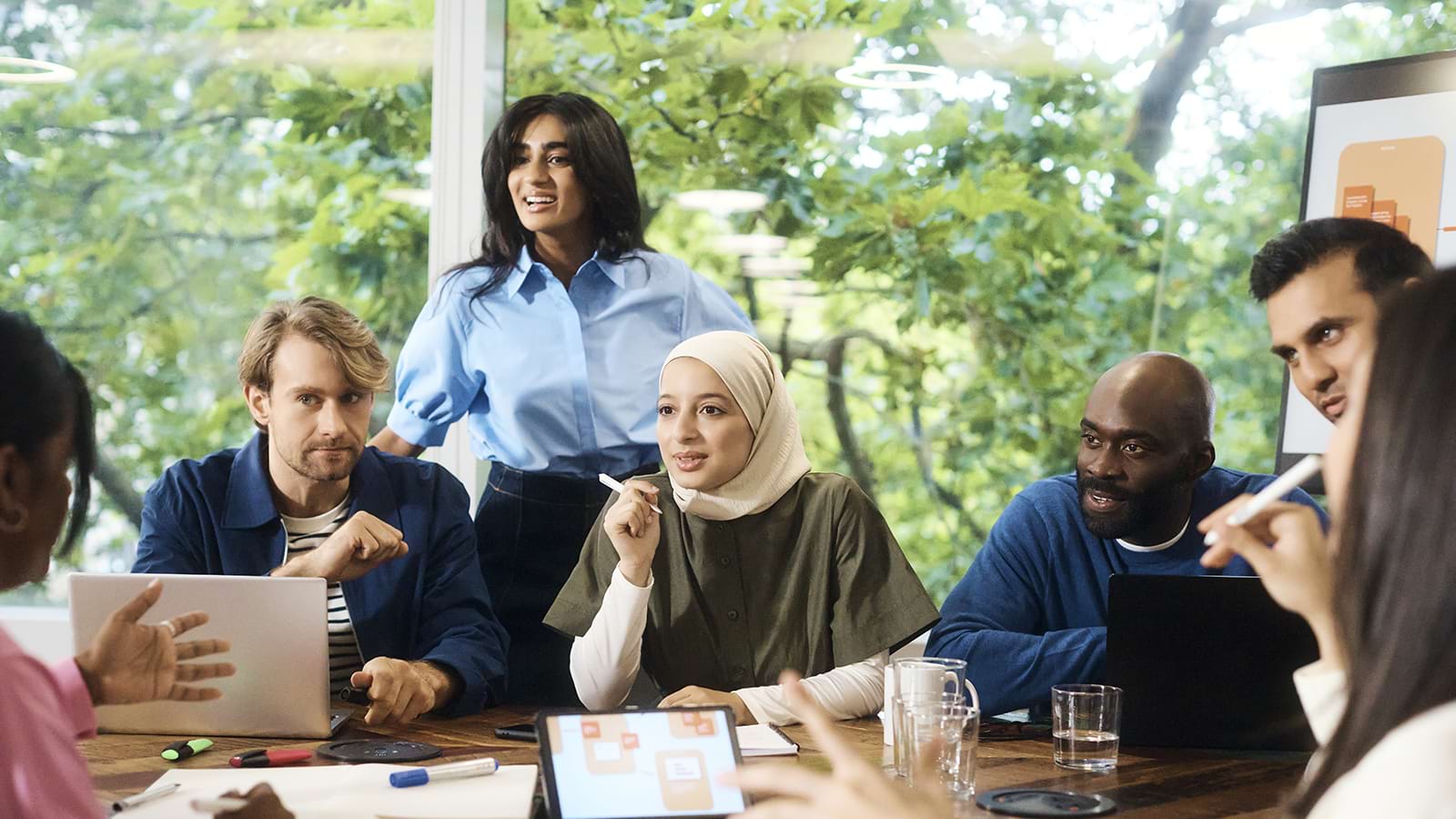 A team of business professionals collaborate in a meeting