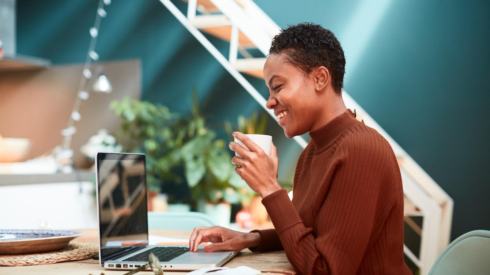 Woman reading about tax reform on her computer.