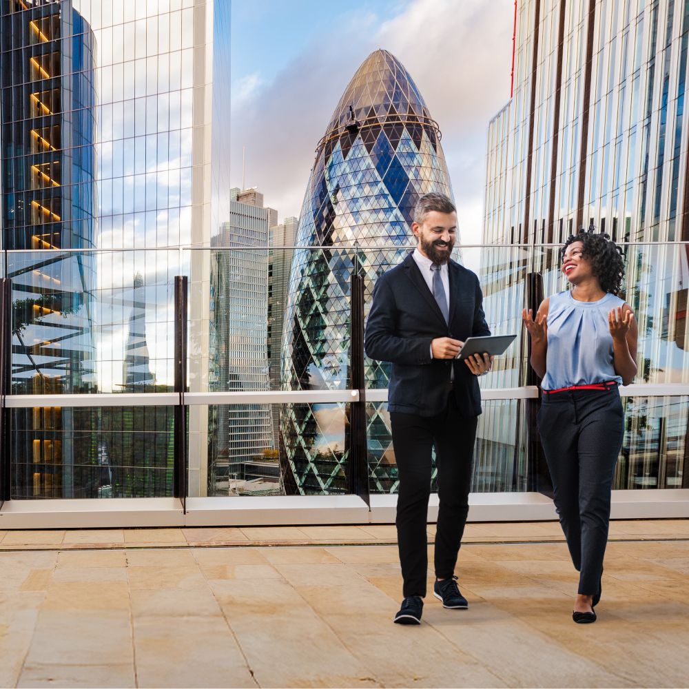 Business people in front of office buildings