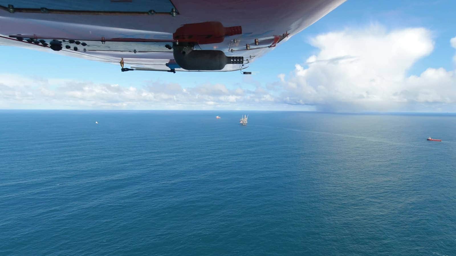 drone flying above see